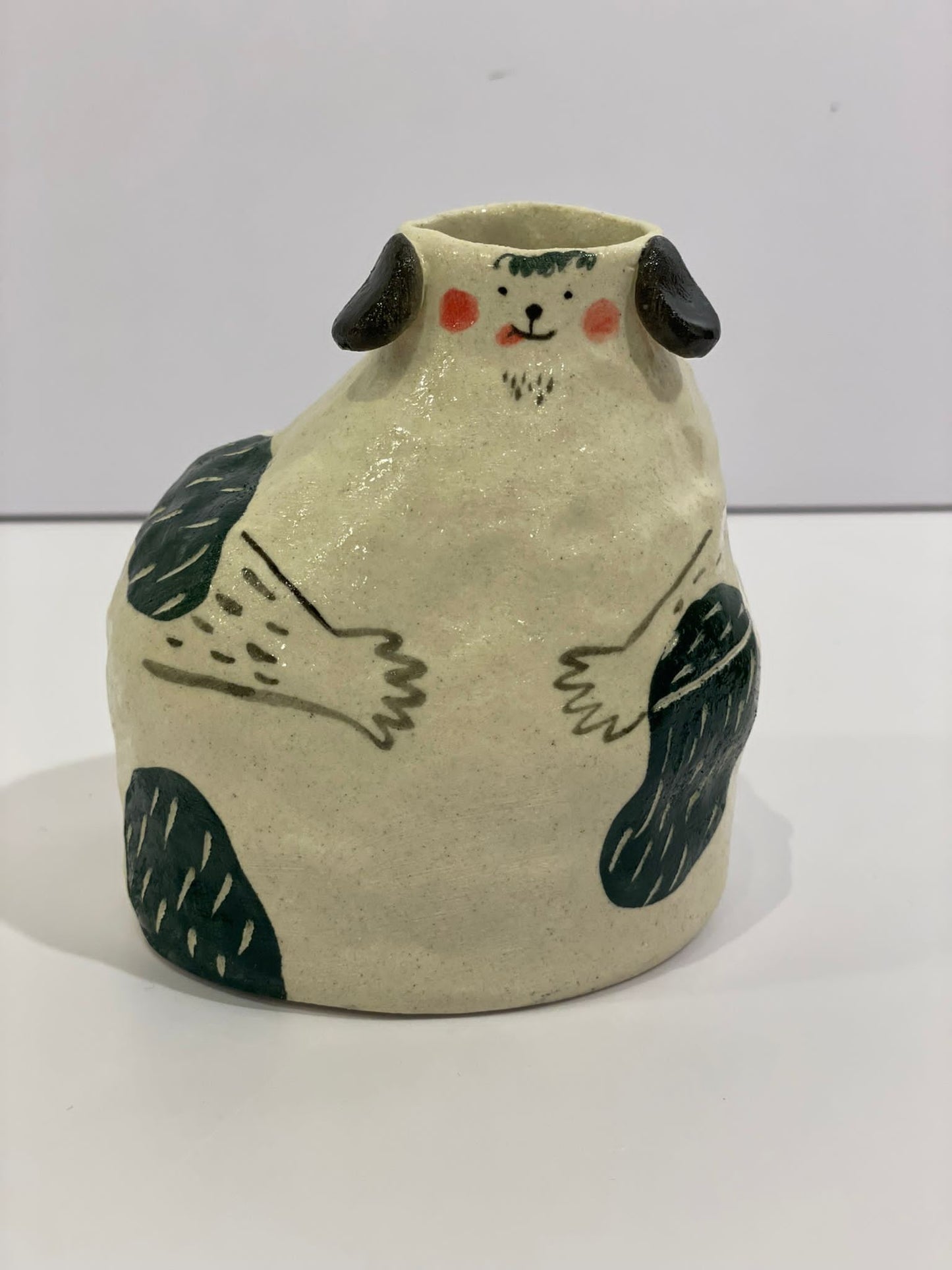 Porcelain vase-dog